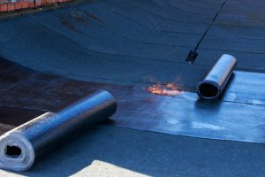 gas burner and roofing material